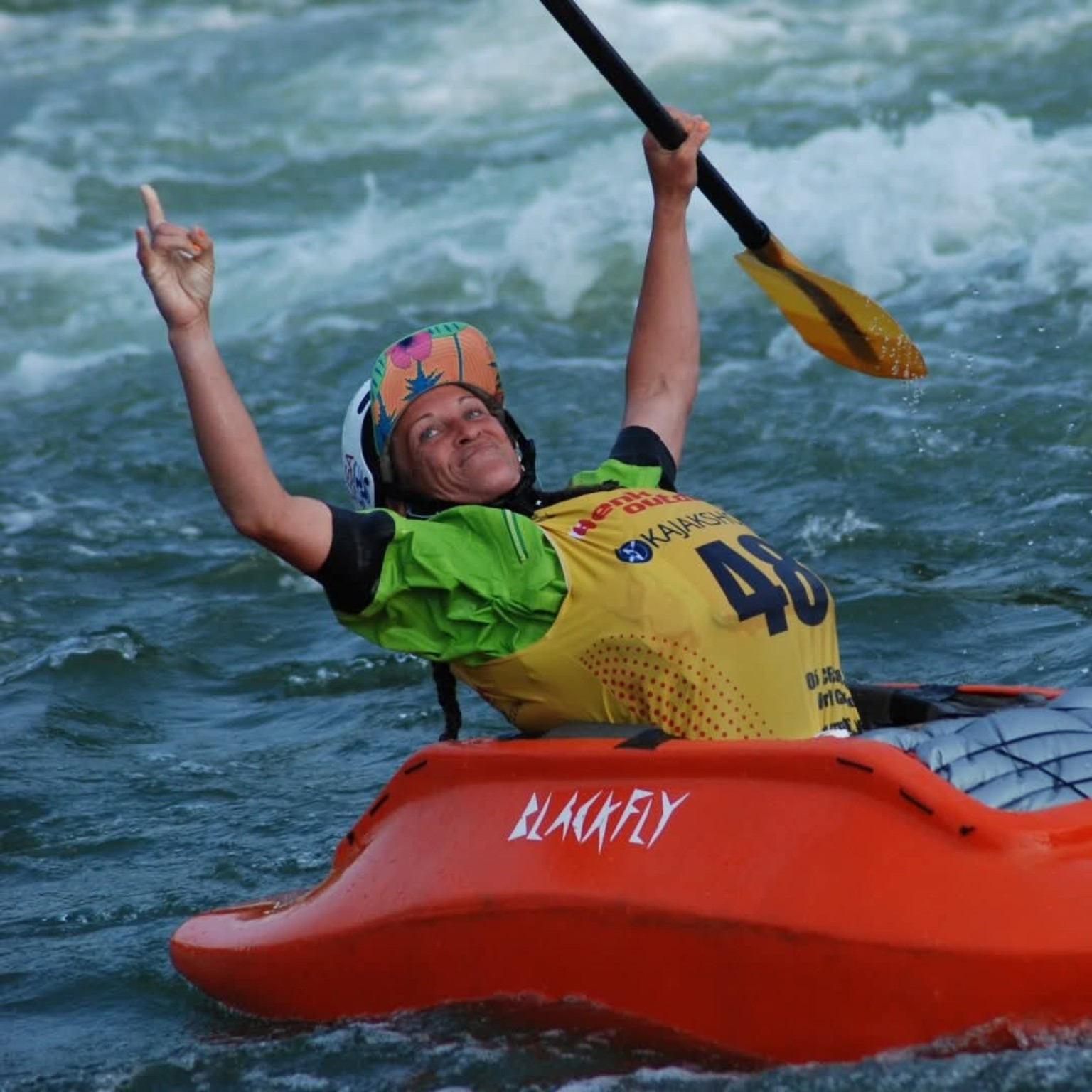 Holly Reppert celebrating in her OC1 at the 2025 World Championships in Plattling